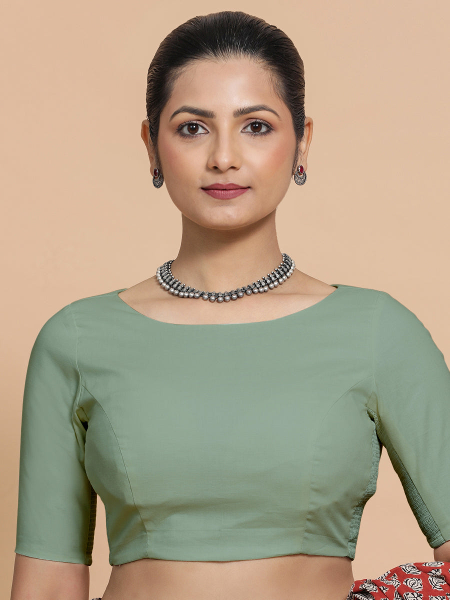 Alka x Rozaana Saree Blouse, in Green Linen, featuring elbow sleeves and boat neckline, made for daily & work (view 6).