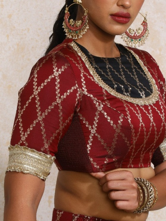Amaavi x Tyohaar Saree Blouse, in Maroon Viscose Silk Brocade, featuring elbow sleeves and jewel neckline (view 3).