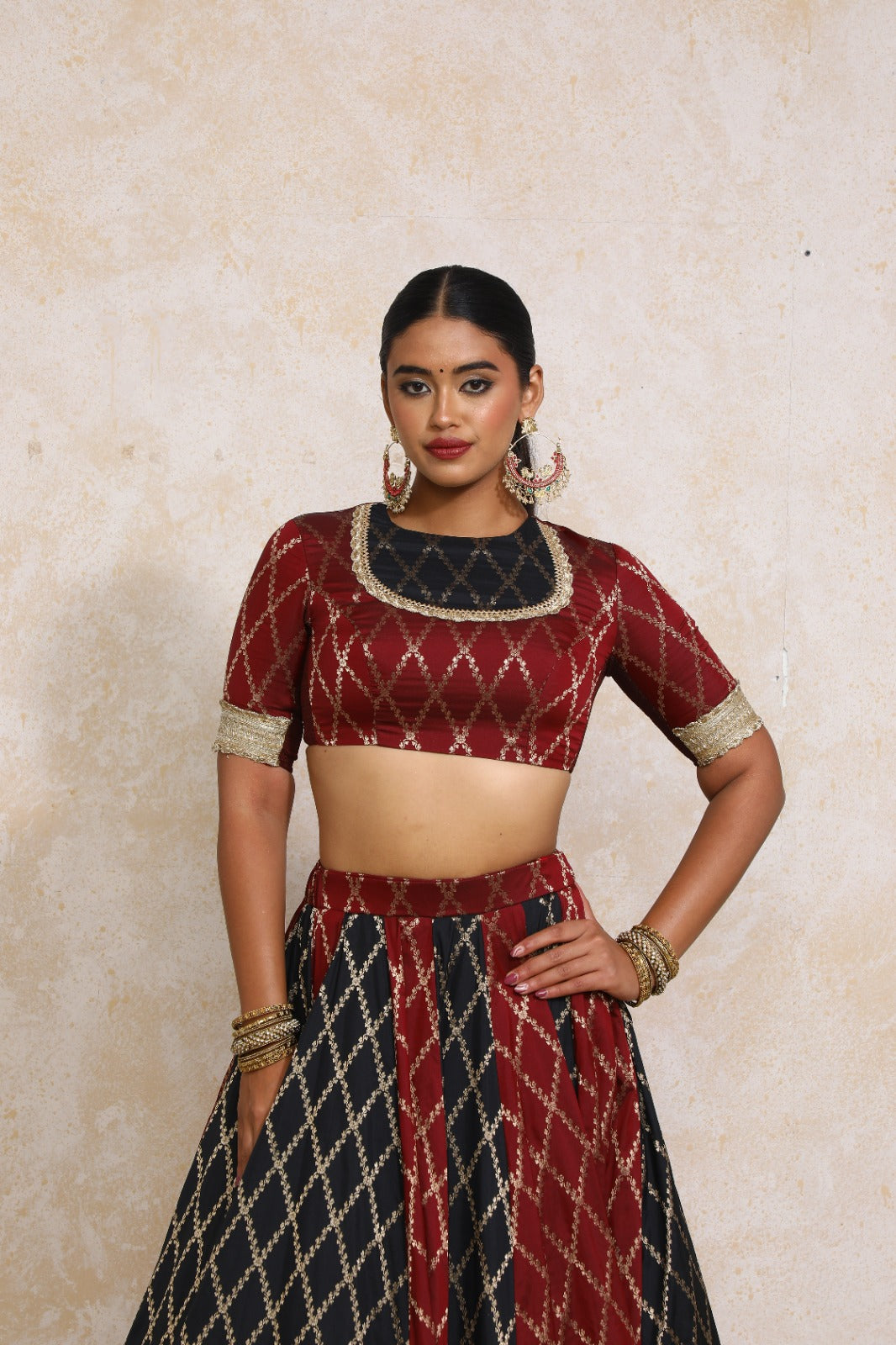 Amaavi x Tyohaar Saree Blouse, in Maroon Viscose Silk Brocade, featuring elbow sleeves and jewel neckline (view 5).