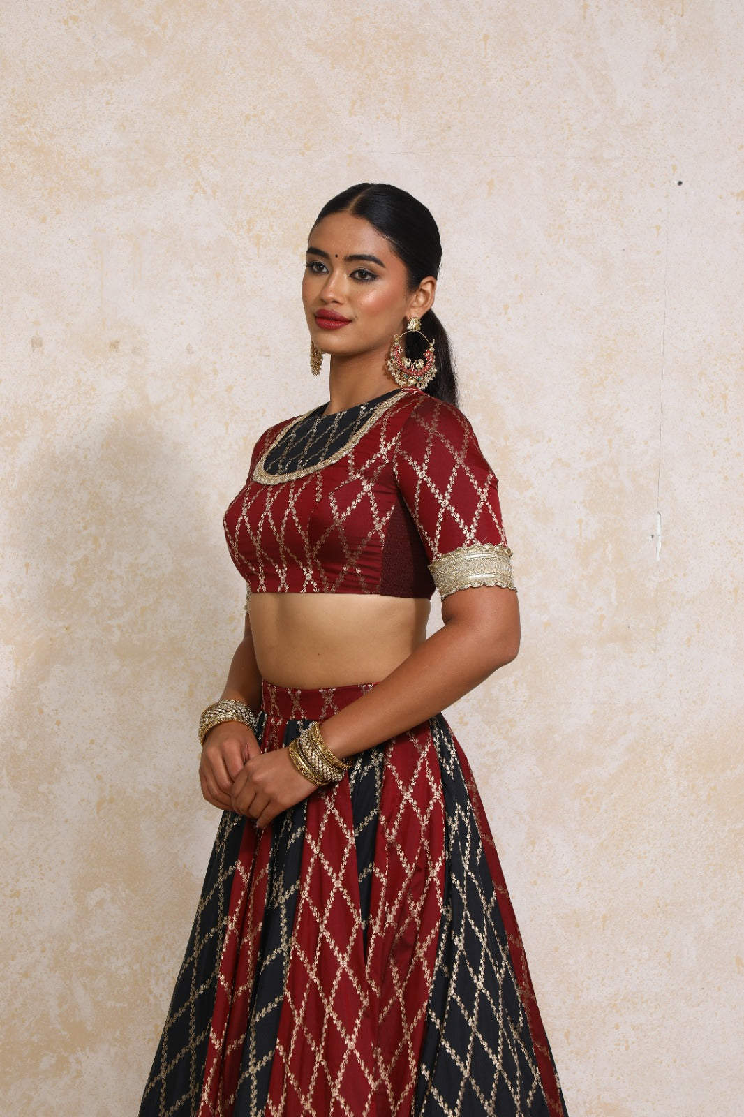 Amaavi x Tyohaar Saree Blouse, in Maroon Viscose Silk Brocade, featuring elbow sleeves and jewel neckline (view 6).
