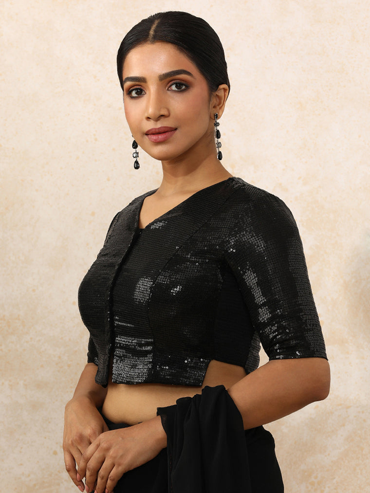 Amina x Tyohaar Saree Blouse, in Black Sequin Fabric, featuring elbow sleeves and v-neckline, made for party & festive.