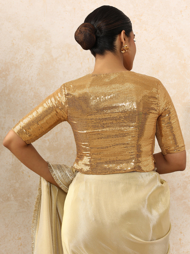 Amina x Tyohaar Saree Blouse, in Gold Sequin Fabric, featuring elbow sleeves and v-neckline, made for party & festive (view 2).