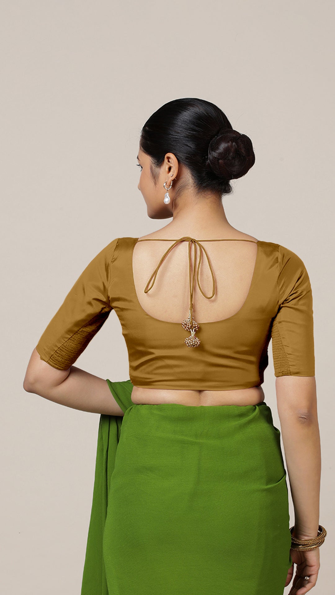 Anisha x Rozaana Saree Blouse, in Gold Vegan Silk, featuring elbow sleeves and round neckline, made for daily & work (view 2).