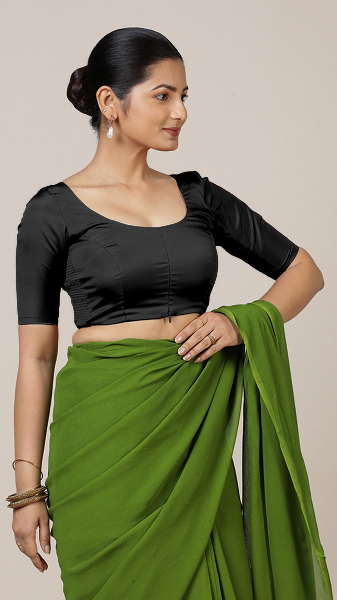 Anisha x Rozaana Saree Blouse, in Black Vegan Silk, featuring elbow sleeves and round neckline, made for daily & work.