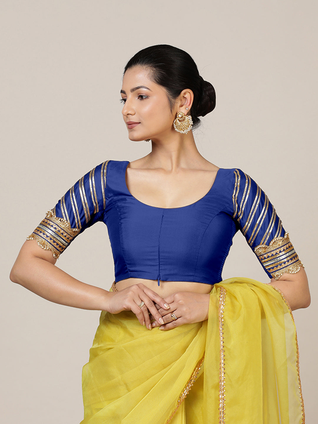 Anisha x Tyohaar Saree Blouse, in Blue Vegan Silk, featuring elbow sleeves and round neckline, made for party & festive.