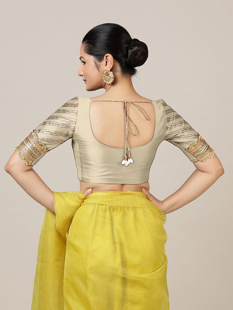 Anisha x Tyohaar Saree Blouse, in Cream Vegan Silk, featuring elbow sleeves and round neckline, made for party & festive.