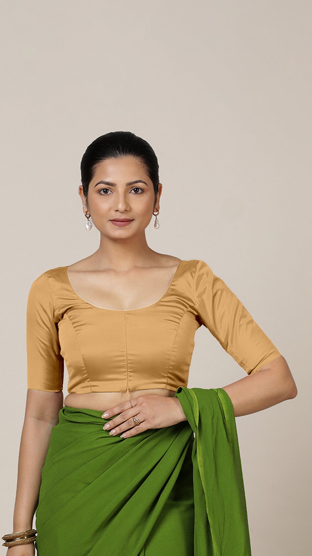 Anisha x Rozaana Saree Blouse, in Gold Vegan Silk, featuring elbow sleeves and round neckline, made for daily & work.