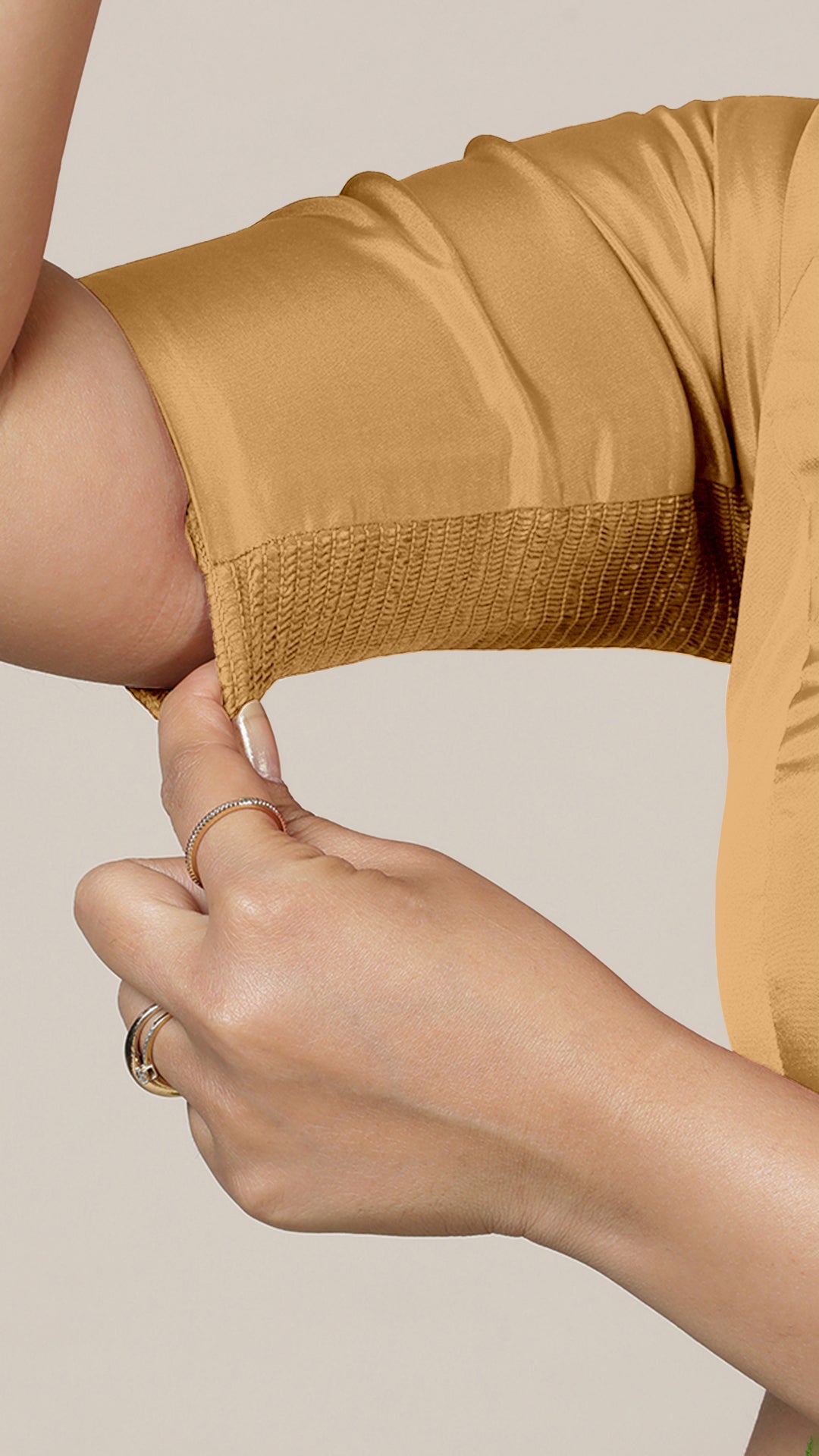 Anisha x Rozaana Saree Blouse, in Gold Vegan Silk, featuring elbow sleeves and round neckline, made for daily & work (view 5).