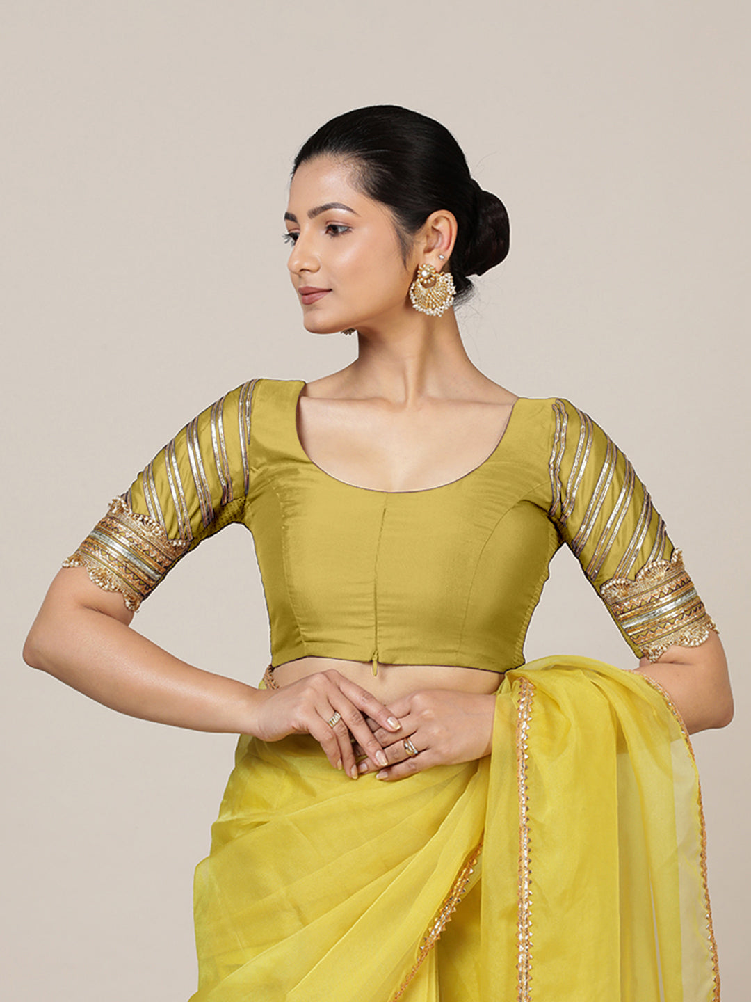 Anisha x Tyohaar Saree Blouse, in Yellow Vegan Silk, featuring elbow sleeves and round neckline, made for party & festive.