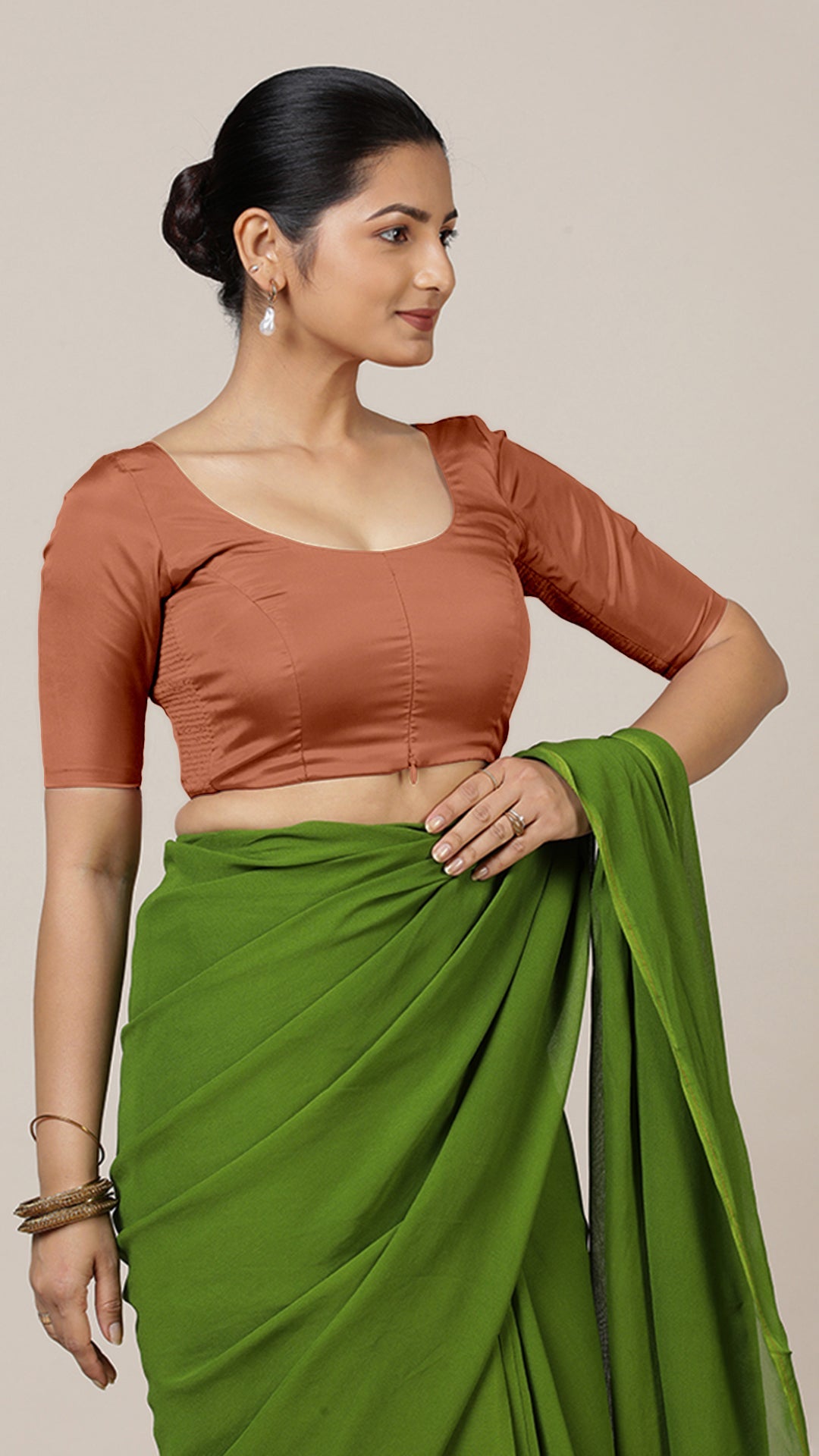 Anisha x Rozaana Saree Blouse, in Copper Vegan Silk, featuring elbow sleeves and round neckline, made for daily & work.