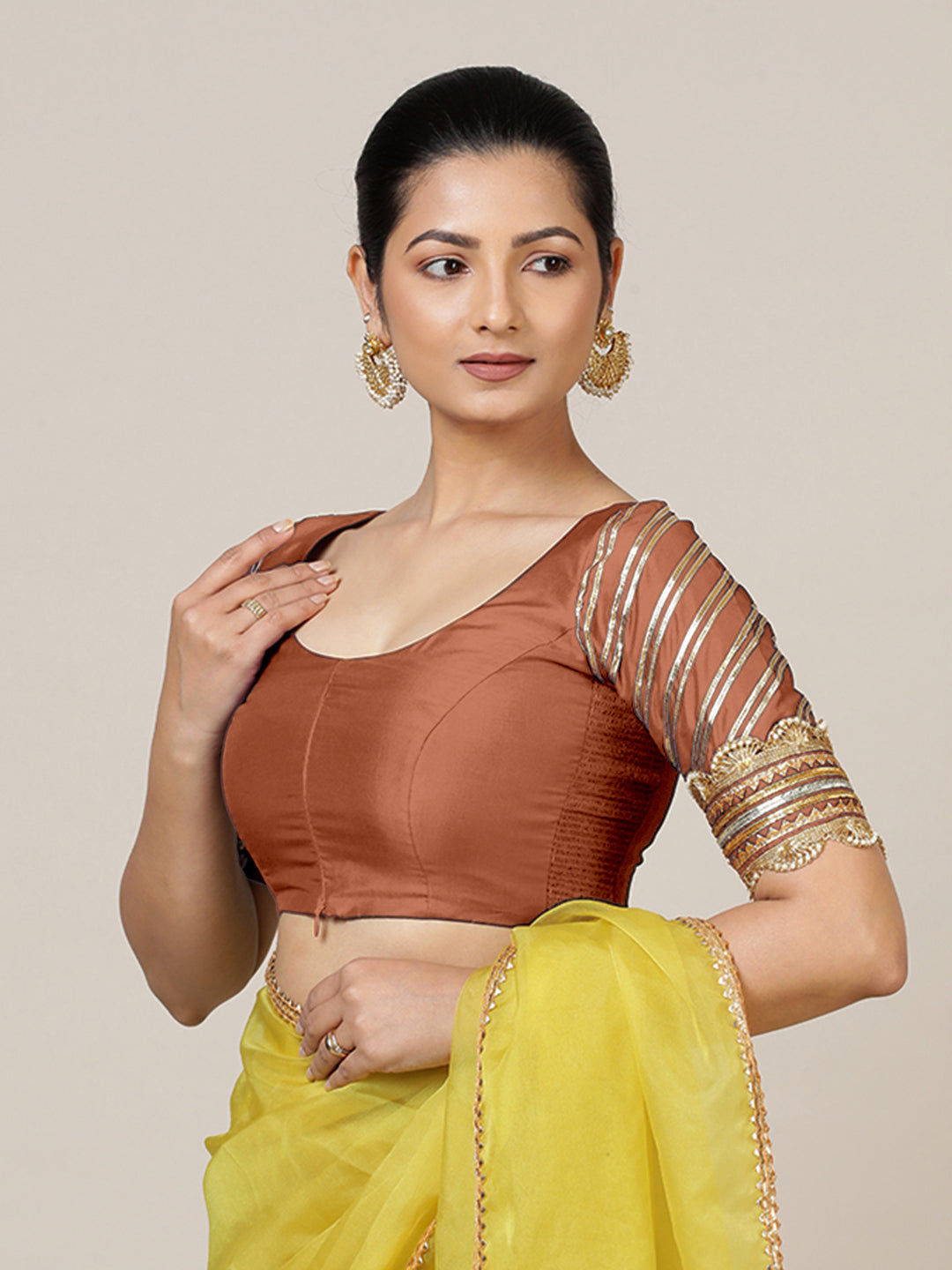 Anisha x Tyohaar Saree Blouse, in Copper Vegan Silk, featuring elbow sleeves and round neckline, made for party & festive.
