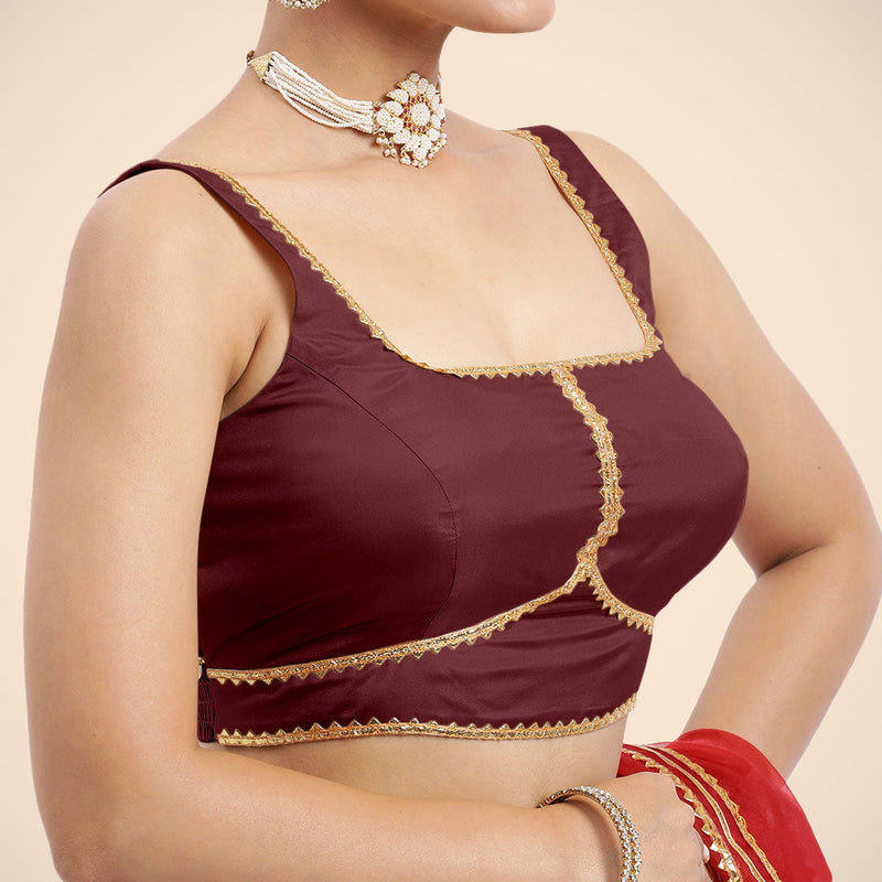 Arya x Tyohaar | Burgundy Sleeveless FlexiFit™ Saree Blouse with Square Neck and Back Window Embeliished with Golden Gota and Pearl Lace-Binks