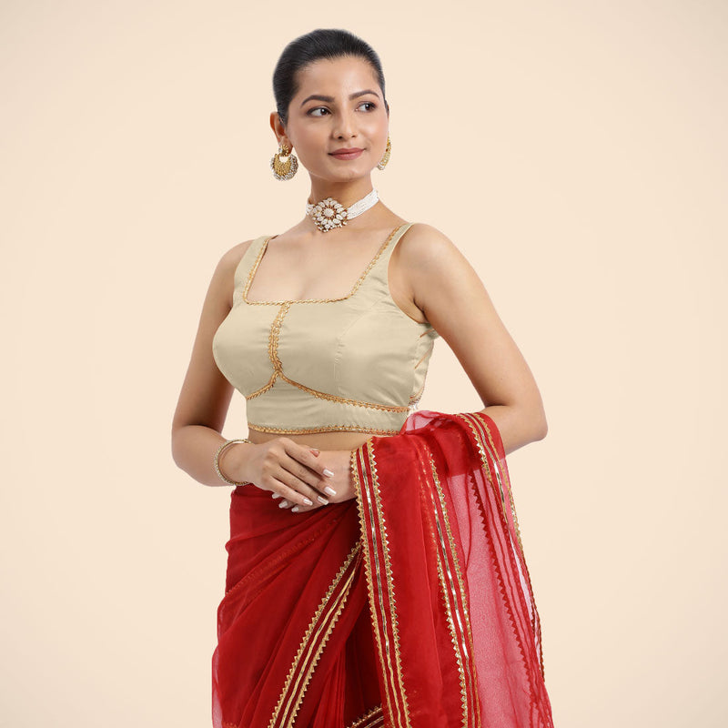 Arya x Tyohaar | Cream Sleeveless FlexiFit™ Saree Blouse with Square Neck and Back Window Embeliished with Golden Gota and Pearl Lace-Binks
