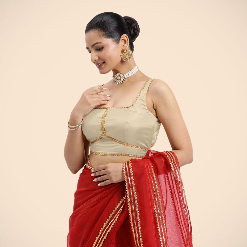 Arya x Tyohaar | Cream Sleeveless FlexiFit™ Saree Blouse with Square Neck and Back Window Embeliished with Golden Gota and Pearl Lace-Binks