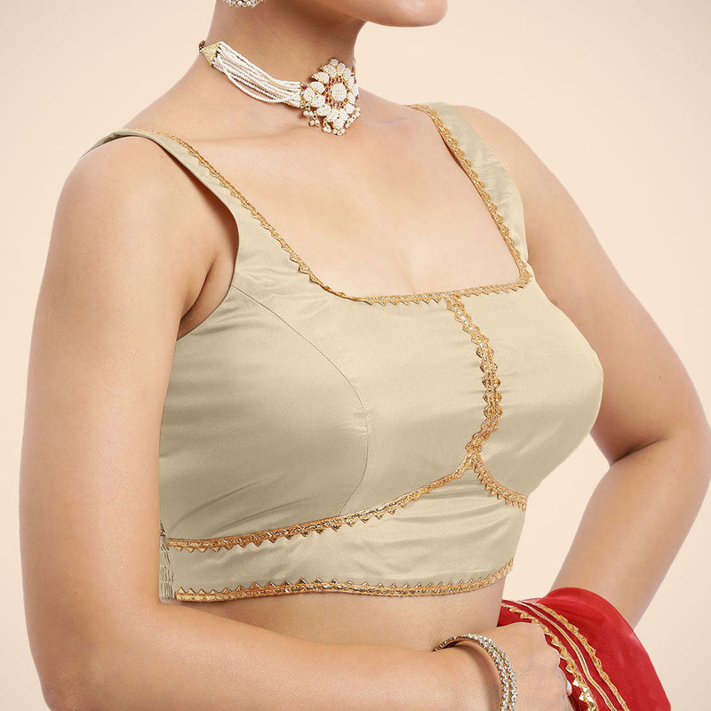 Arya x Tyohaar | Cream Sleeveless FlexiFit™ Saree Blouse with Square Neck and Back Window Embeliished with Golden Gota and Pearl Lace-Binks