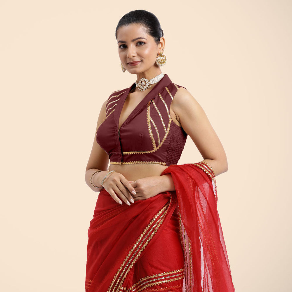 Avni x Tyohaar | Burgundy Sleeveless FlexiFit™ Saree Blouse with Elegant Shawl Collar with Golden Gota Lace Embellishment