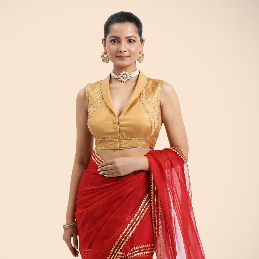 Avni x Tyohaar Saree Blouse, in Gold Vegan Silk, featuring sleeveless and shawl neckline, made for party & festive.