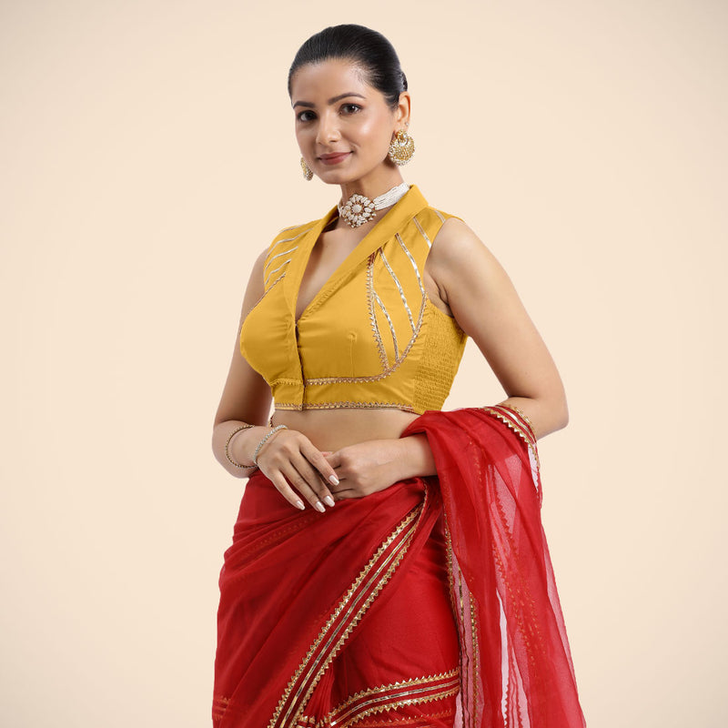 Avni x Tyohaar | Sleeveless Marigold Yellow FlexiFit™ Gota Embellished Saree Blouse with Shawl Neck-Binks