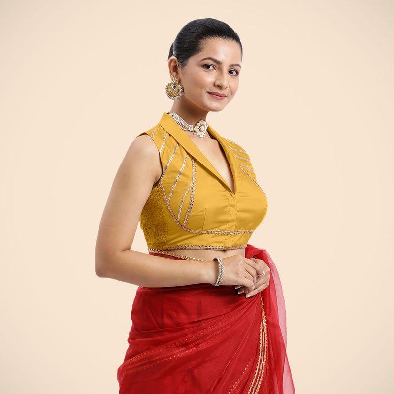 Avni x Tyohaar | Sleeveless Marigold Yellow FlexiFit™ Gota Embellished Saree Blouse with Shawl Neck-Binks