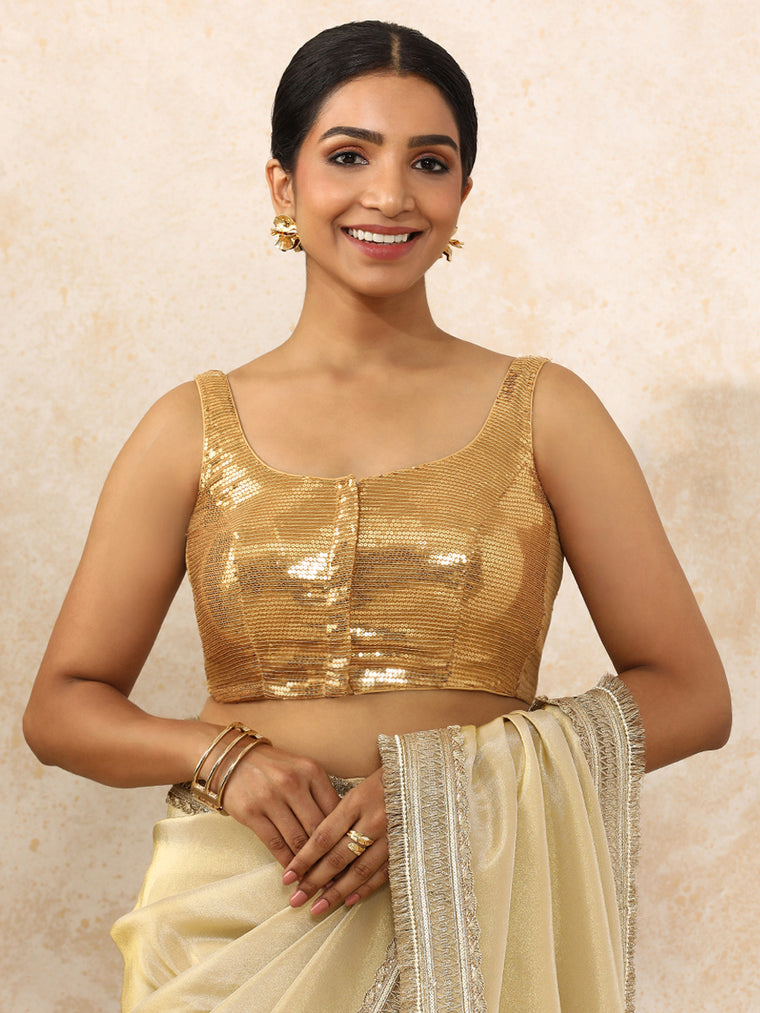 Ayesha x Tyohaar Saree Blouse, in Gold Sequin Fabric, featuring sleeveless and round neckline, made for party & festive.