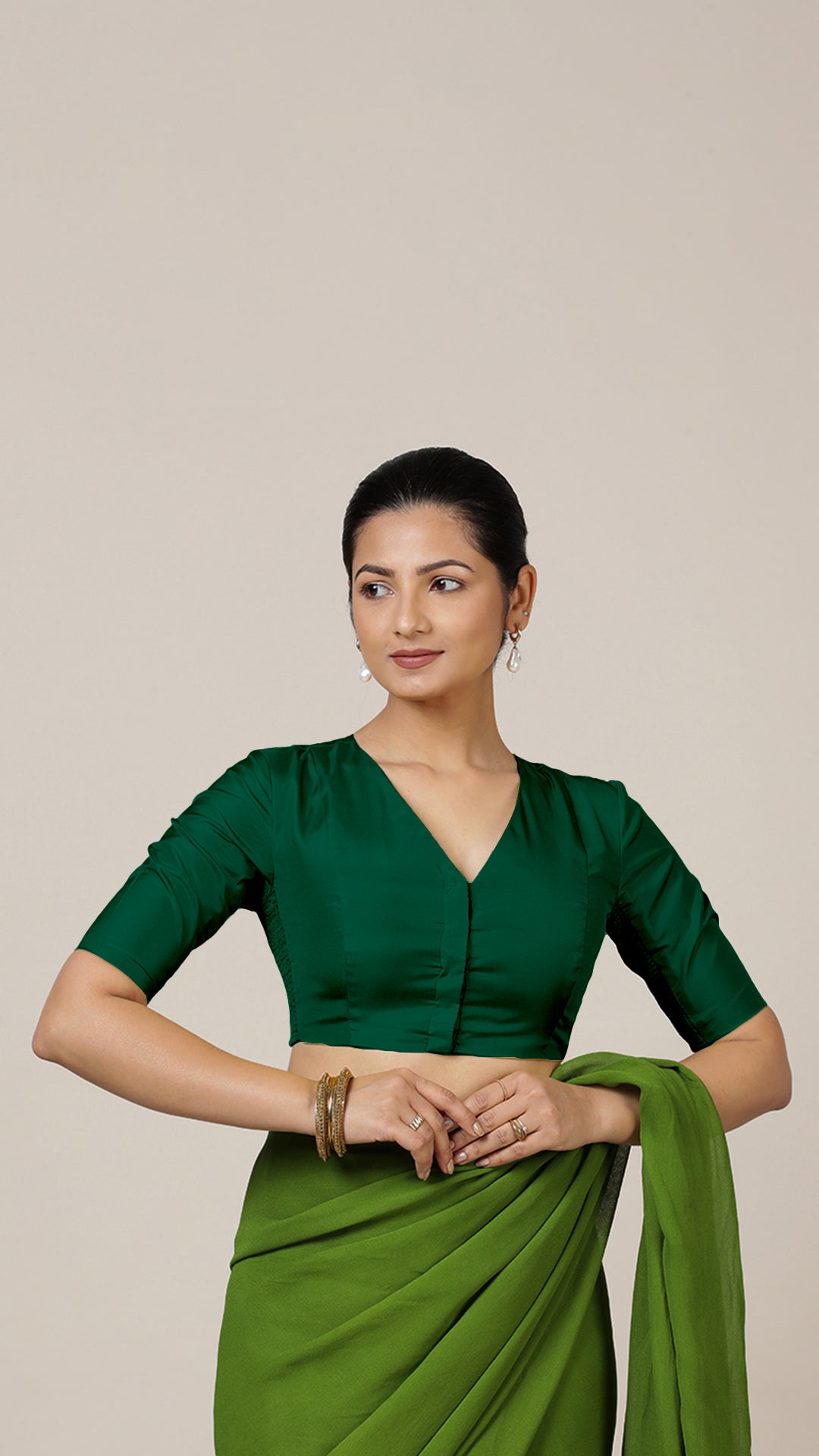 Begum x Rozaana Saree Blouse, in Green Vegan Silk, featuring elbow sleeves and v-neckline, made for daily & work.