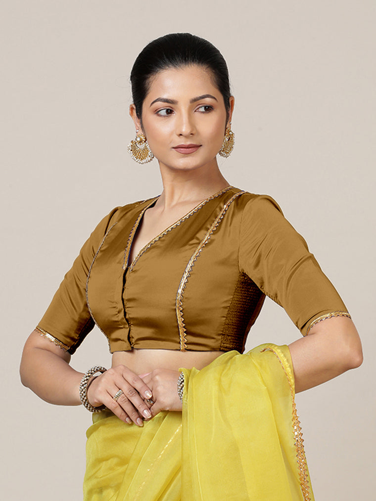 Begum x Tyohaar Saree Blouse, in Gold Vegan Silk, featuring elbow sleeves and v-neckline, made for party & festive.