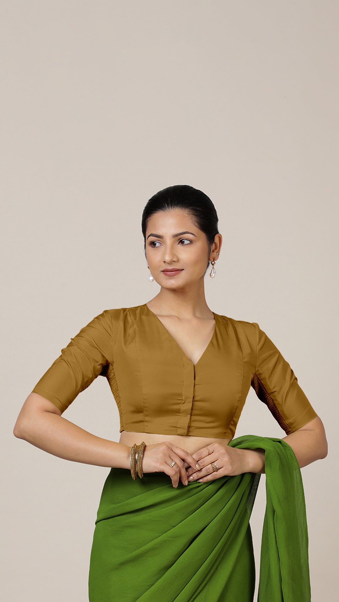 Begum x Rozaana Saree Blouse, in Gold Vegan Silk, featuring elbow sleeves and v-neckline, made for daily & work (view 7).