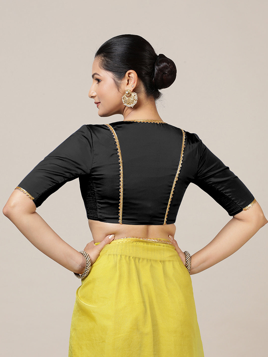 Begum x Tyohaar Saree Blouse, in Black Vegan Silk, featuring elbow sleeves and v-neckline, made for party & festive (view 3).