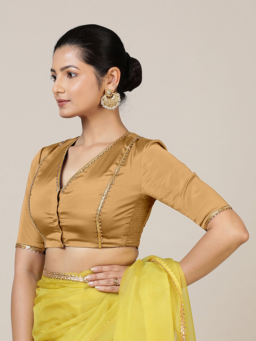 Begum x Tyohaar Saree Blouse, in Gold Vegan Silk, featuring elbow sleeves and v-neckline, made for party & festive.