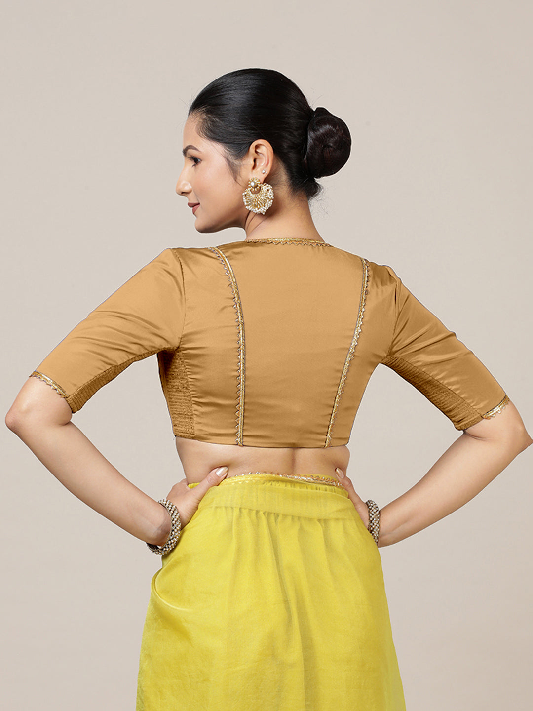 Begum x Tyohaar Saree Blouse, in Gold Vegan Silk, featuring elbow sleeves and v-neckline, made for party & festive (view 2).