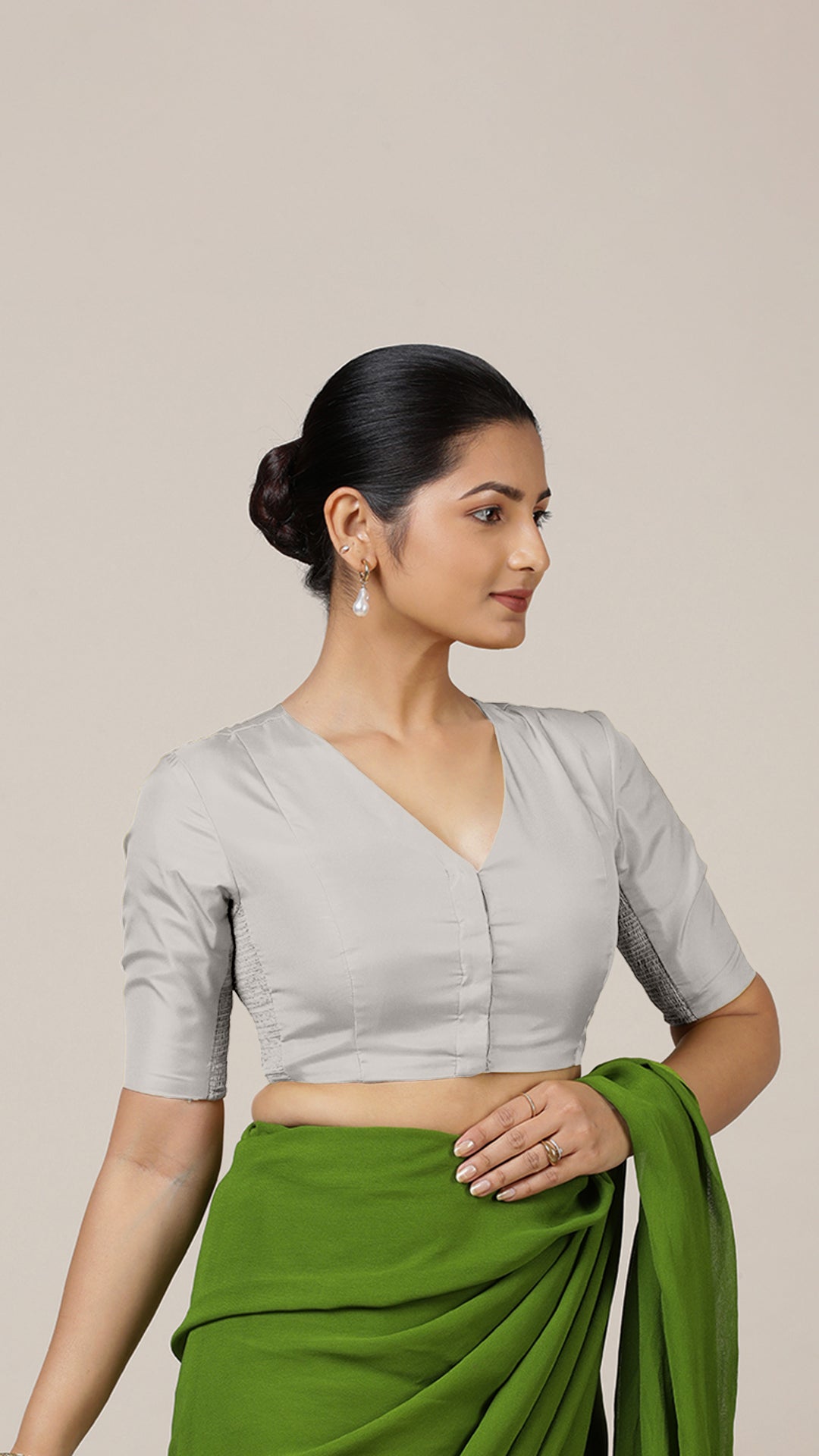 Begum x Rozaana Saree Blouse, in Silver Vegan Silk, featuring elbow sleeves and v-neckline, made for daily & work.