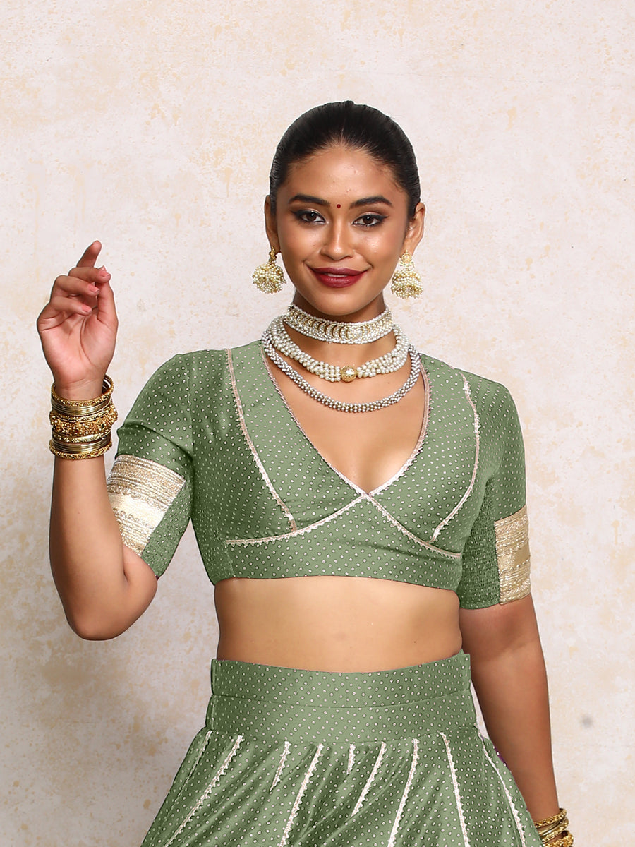Elira x Tyohaar Saree Blouse, in Green Chandheri, featuring elbow sleeves and v-neckline, made for party & festive.