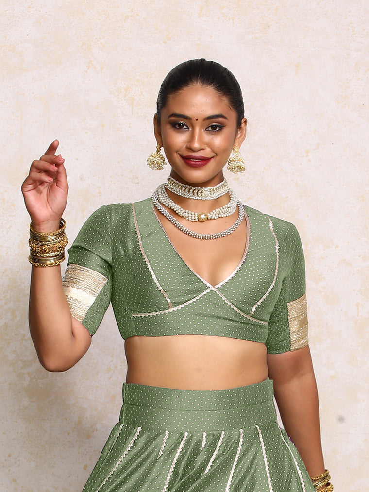 Elira x Tyohaar Saree Blouse, in Green Chandheri, featuring elbow sleeves and v-neckline, made for party & festive.