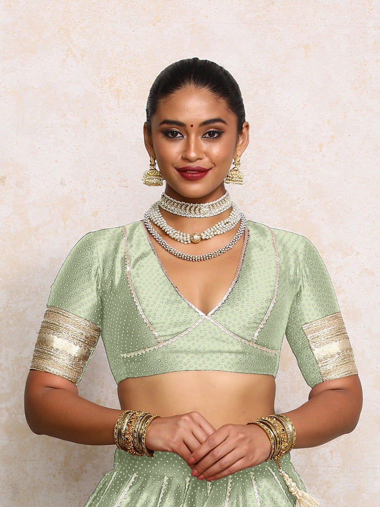 Elira x Tyohaar Saree Blouse, in Green Chandheri, featuring elbow sleeves and v-neckline, made for party & festive.