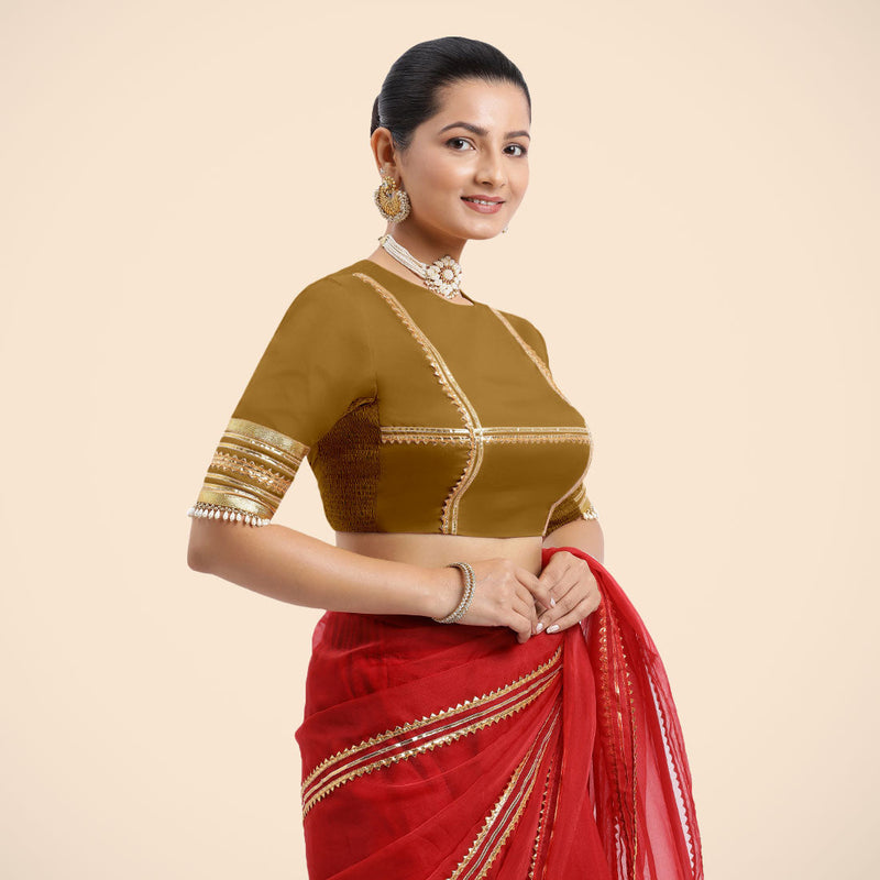 Farheen x Tyohaar | Bronze Gold Embellished Elbow Sleeves FlexiFit™ Saree Blouse with Zero Neck with Back Cut-Out and Golden Gota Embellishment-Binks