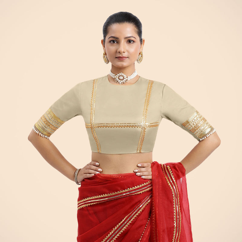 Farheen x Tyohaar | Cream Embellished Elbow Sleeves FlexiFit™ Saree Blouse with Zero Neck with Back Cut-Out and Golden Gota Embellishment-Binks