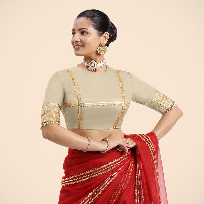 Farheen x Tyohaar | Cream Embellished Elbow Sleeves FlexiFit™ Saree Blouse with Zero Neck with Back Cut-Out and Golden Gota Embellishment-Binks