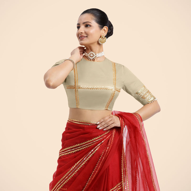 Farheen x Tyohaar | Cream Embellished Elbow Sleeves FlexiFit™ Saree Blouse with Zero Neck with Back Cut-Out and Golden Gota Embellishment-Binks