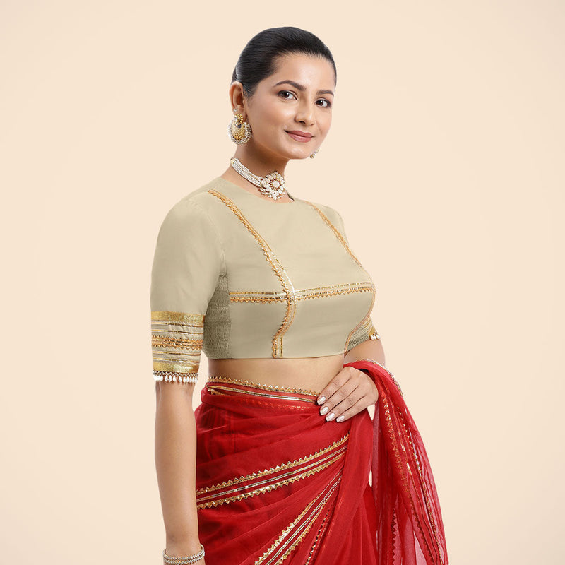 Farheen x Tyohaar | Cream Embellished Elbow Sleeves FlexiFit™ Saree Blouse with Zero Neck with Back Cut-Out and Golden Gota Embellishment-Binks