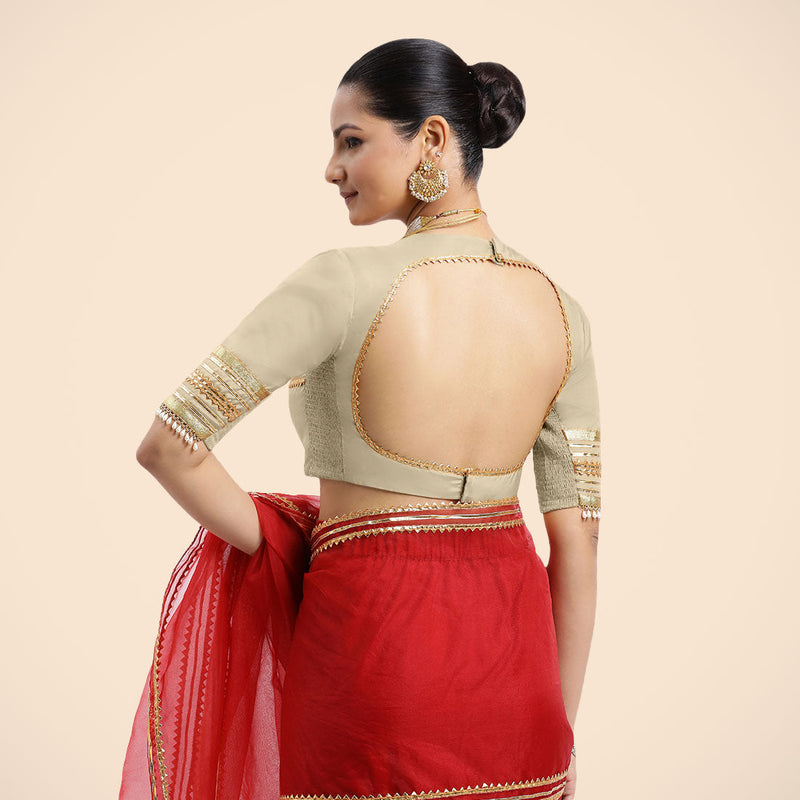 Farheen x Tyohaar | Cream Embellished Elbow Sleeves FlexiFit™ Saree Blouse with Zero Neck with Back Cut-Out and Golden Gota Embellishment-Binks