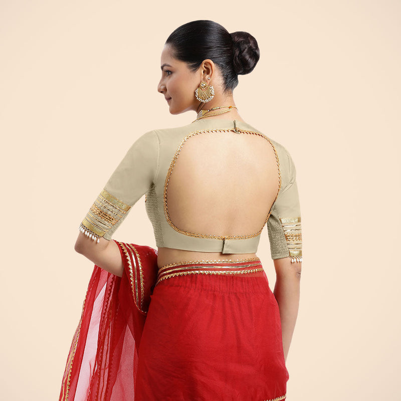 Farheen x Tyohaar | Cream Embellished Elbow Sleeves FlexiFit™ Saree Blouse with Zero Neck with Back Cut-Out and Golden Gota Embellishment-Binks