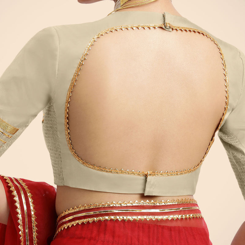 Farheen x Tyohaar | Cream Embellished Elbow Sleeves FlexiFit™ Saree Blouse with Zero Neck with Back Cut-Out and Golden Gota Embellishment-Binks