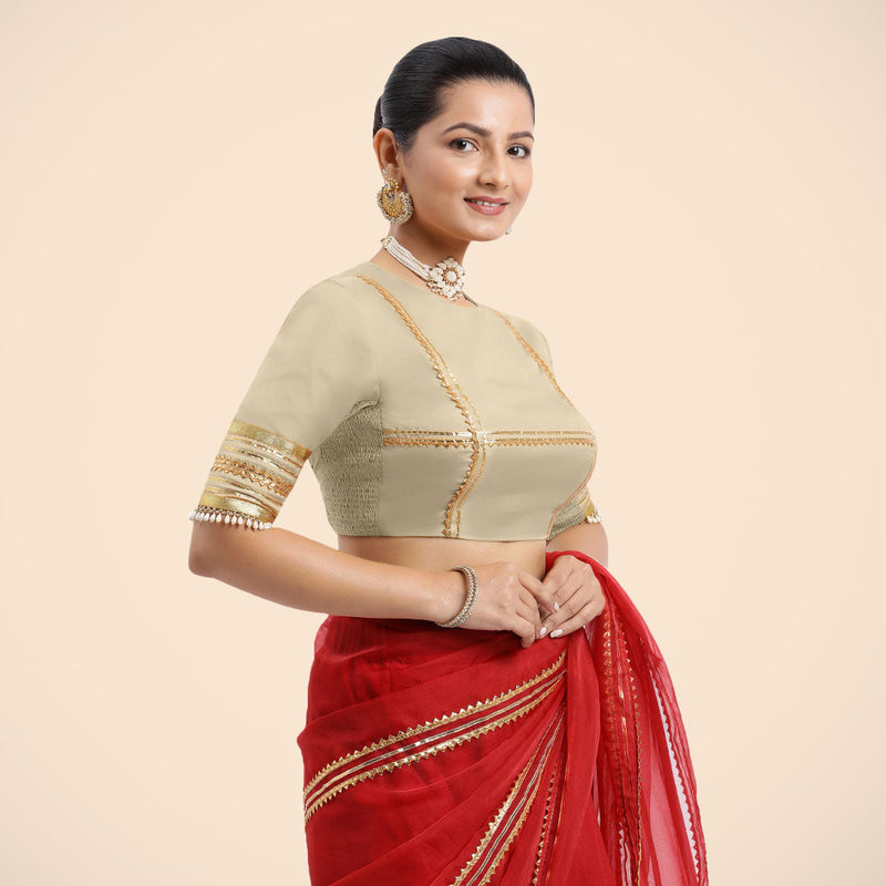 Farheen x Tyohaar | Cream Embellished Elbow Sleeves FlexiFit™ Saree Blouse with Zero Neck with Back Cut-Out and Golden Gota Embellishment-Binks