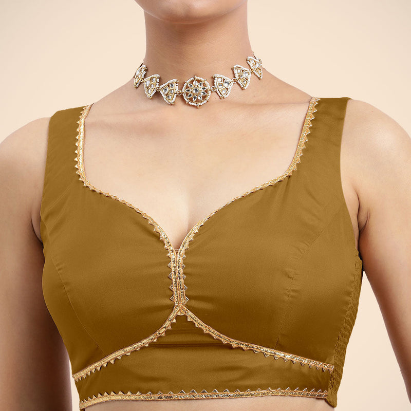 Ishika x Tyohaar | Bronze Gold Sleeveless FlexiFit™ Saree Blouse with Beetle Leaf Neckline with Golden Gota Lace and Back Cut-out with Tie-Up-Binks