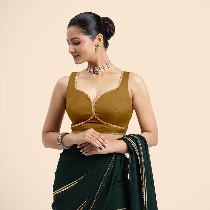 Ishika x Tyohaar | Bronze Gold Sleeveless FlexiFit™ Saree Blouse with Beetle Leaf Neckline with Golden Gota Lace and Back Cut-out with Tie-Up-Binks
