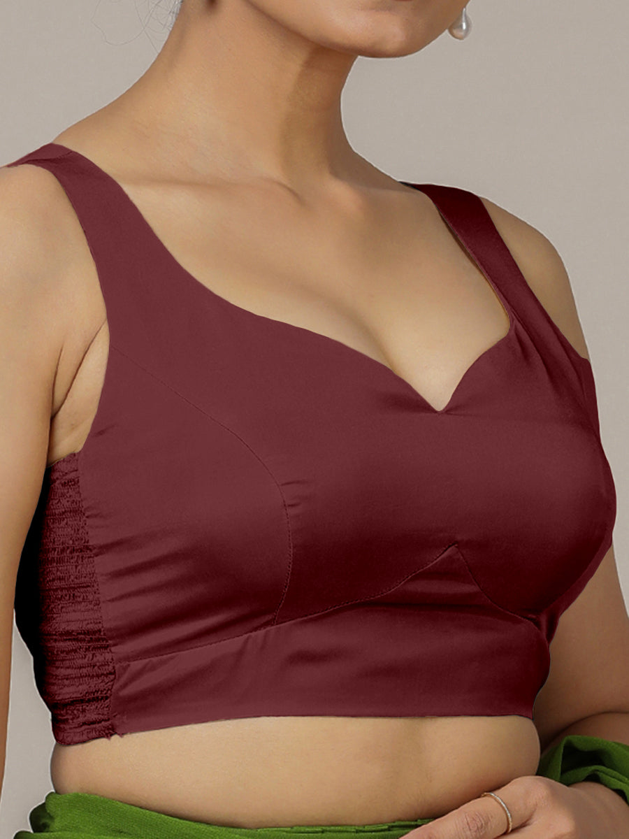 Ishika x Rozaana Saree Blouse, in Maroon Vegan Silk, featuring sleeveless and sweetheart neckline, made for party & festive.