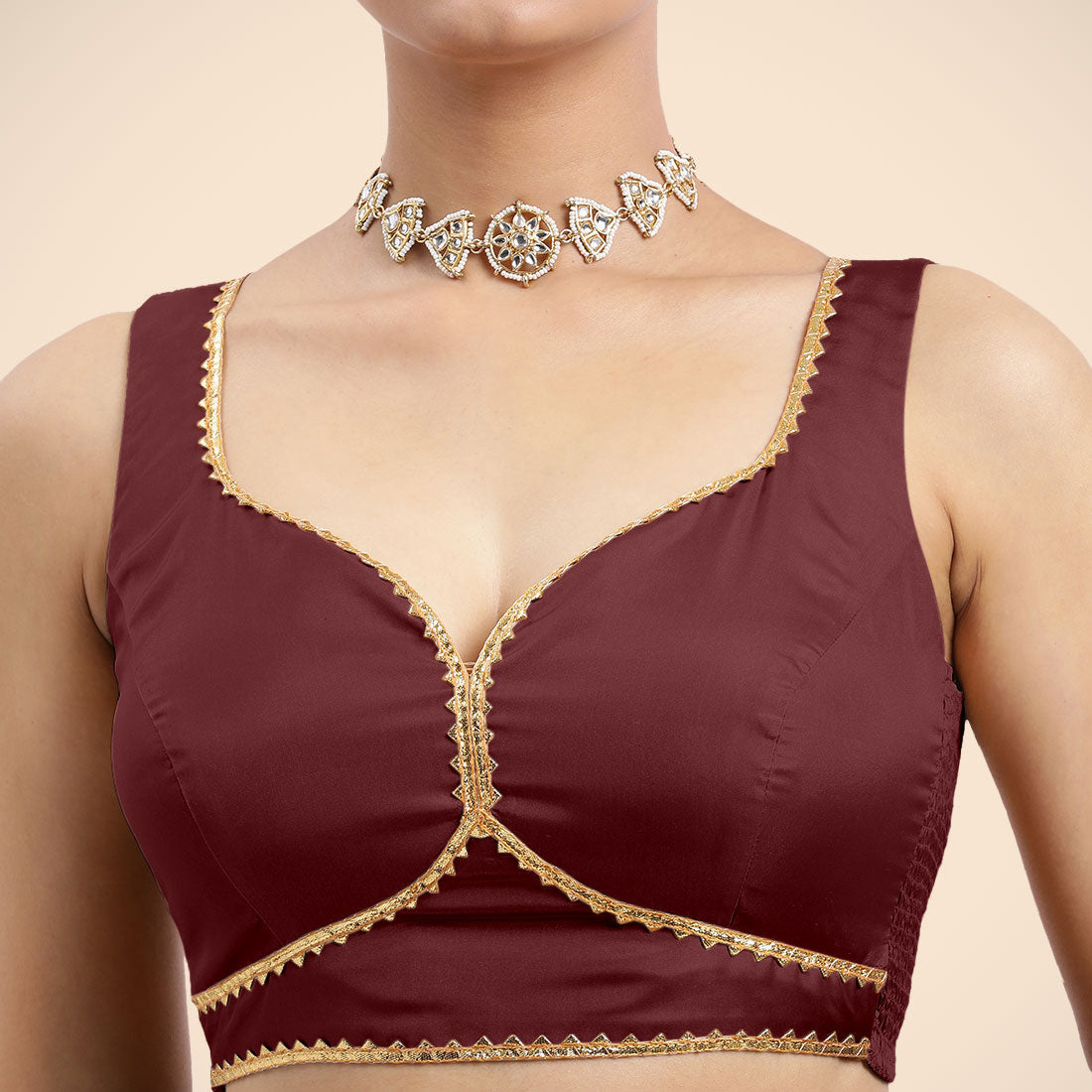 Ishika x Tyohaar Saree Blouse, in Maroon Vegan Silk, featuring sleeveless and sweetheart neckline, made for party & festive.