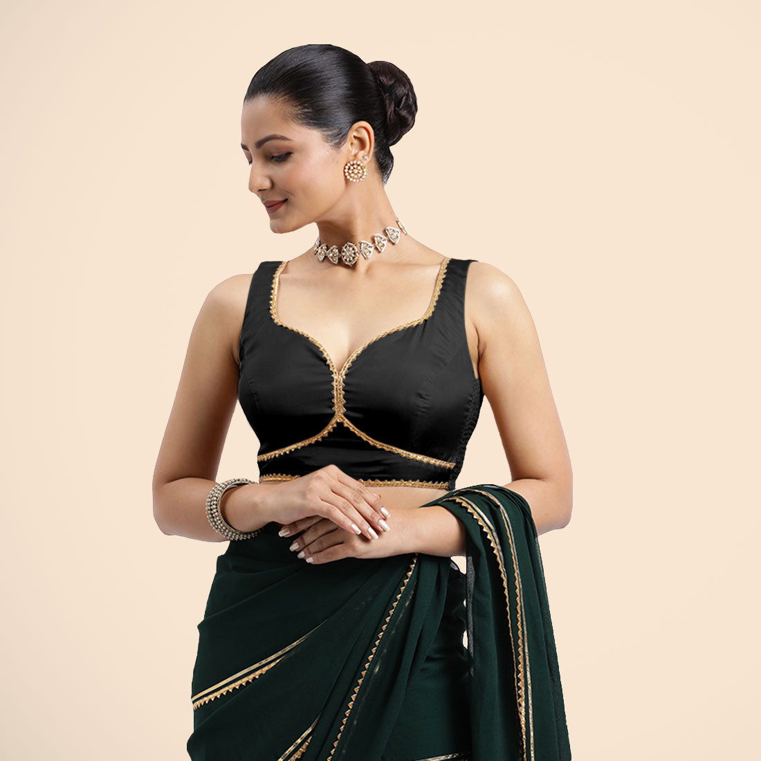 Ishika x Tyohaar Saree Blouse, in Black Vegan Silk, featuring sleeveless and sweetheart neckline, made for party & festive.