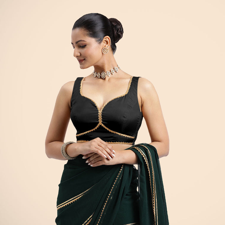 Ishika x Tyohaar Saree Blouse, in Black Vegan Silk, featuring sleeveless and sweetheart neckline, made for party & festive.