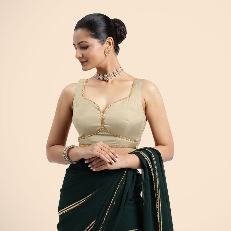 Ishika x Tyohaar | Cream Sleeveless FlexiFit™ Saree Blouse with Beetle Leaf Neckline with Golden Gota Lace and Back Cut-out with Tie-Up-Binks